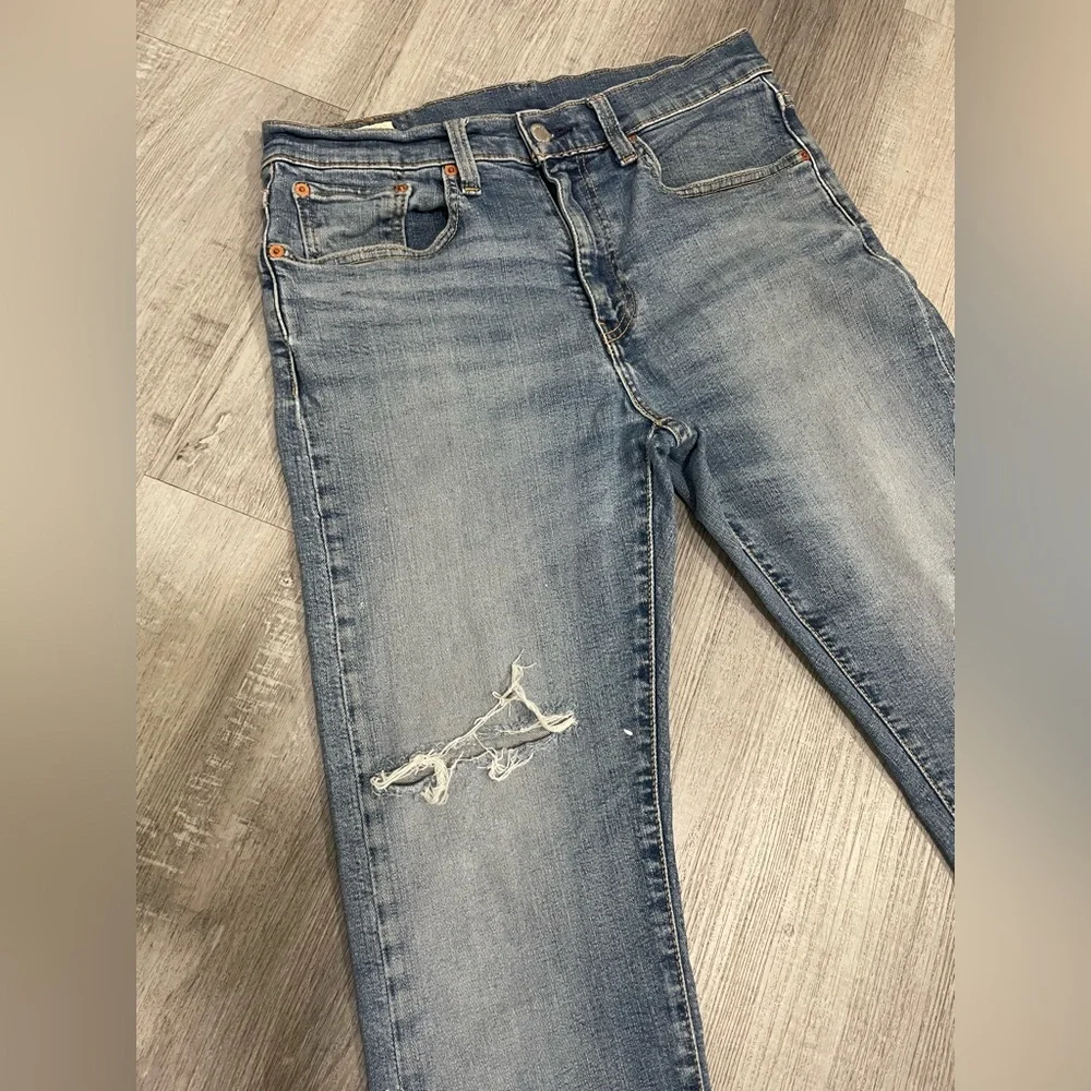Levi's 502👖Men Premium Taper Fit Jeans with Vintage-Inspired Fading,size 31x32